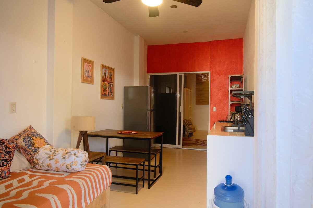 Casa Keiki studio — bed and kitchenette in one open, light-filled room