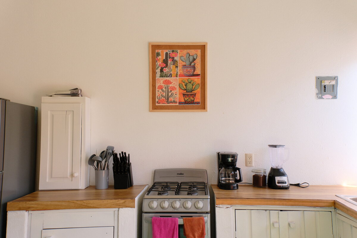 Casa Linda kitchen — gas range, coffee maker, and prep counter